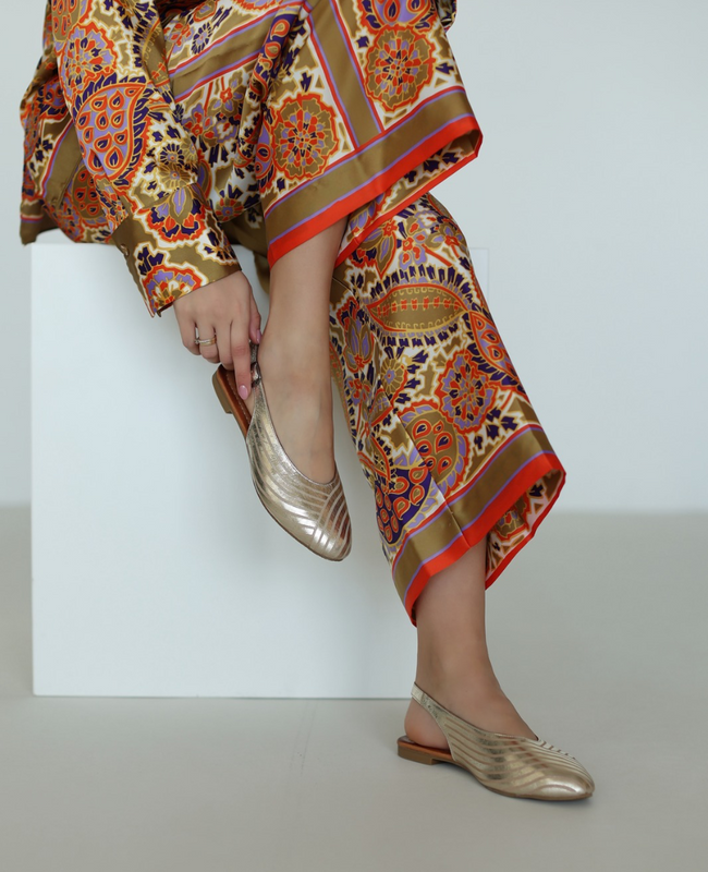 Manuela's leather gold sandals