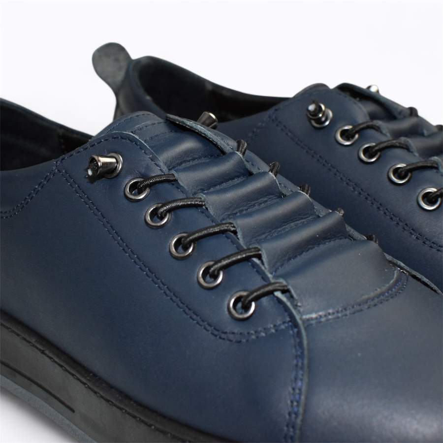 Skórzane granatowe sneakersy damskie Arestia