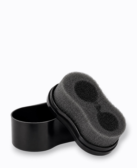 Black self-shining shoe cleaner